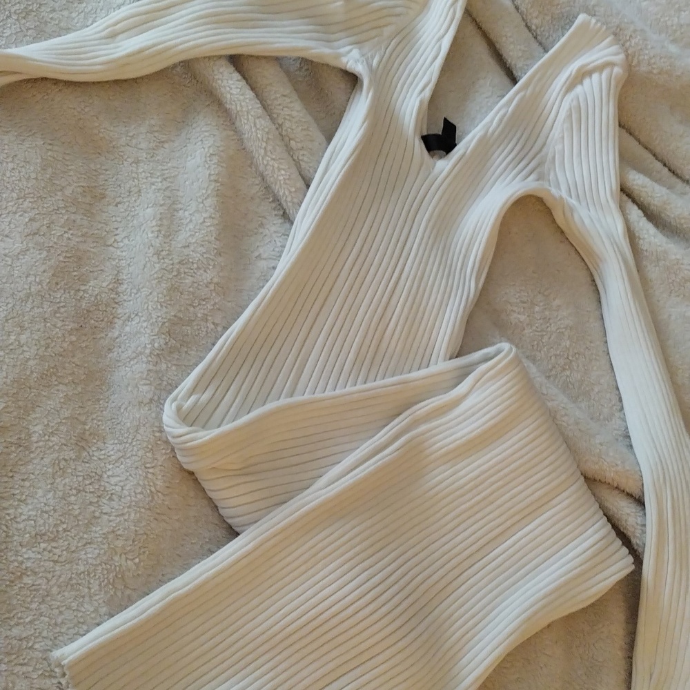Long white dress with long, on or off the shoulder sleeves